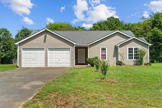 163 Shawn Ln, Chatsworth, GA 30705 - ranch-style home featuring concrete driveway, an attached garage, a front yard, and roof with shingles