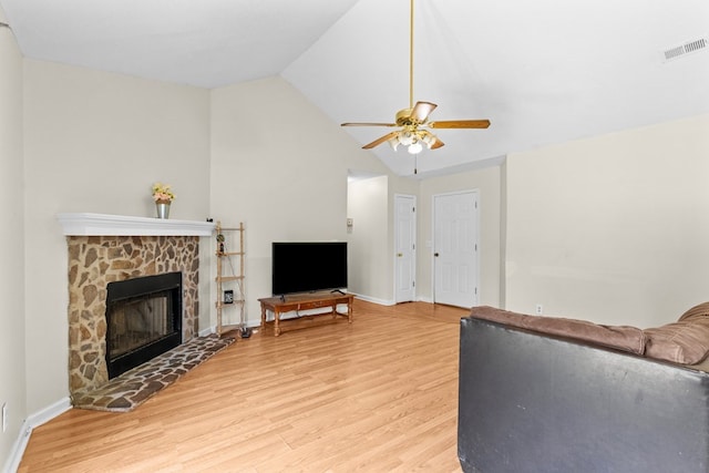 163 Shawn Ln, Chatsworth, GA 30705 - unfurnished living room featuring a ceiling fan, light wood finished floors, a fireplace, and high vaulted ceiling