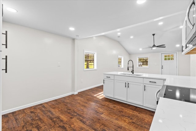 kitchen with dark wood-style flooring, a ceiling fan, a sink, and recessed lighting