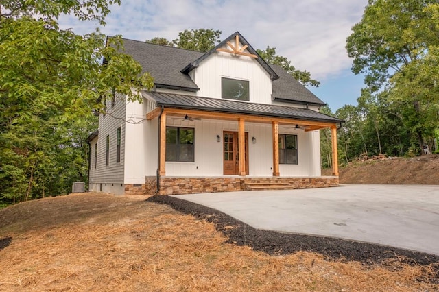 209 Crest Dr, Rocky Face, GA 30740 - modern inspired farmhouse with a standing seam roof, a ceiling fan, covered porch, and metal roof