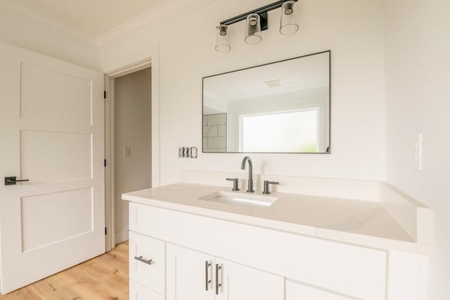 209 Crest Dr, Rocky Face, GA 30740 - bathroom with ornamental molding, vanity, and wood finished floors