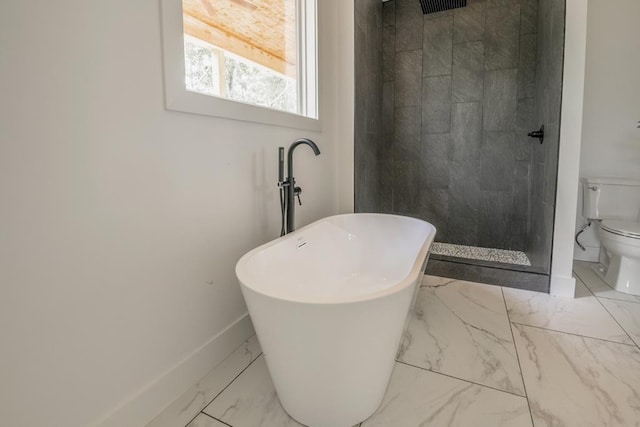 209 Crest Dr, Rocky Face, GA 30740 - bathroom featuring marble finish floors, a soaking tub, tiled shower, toilet, and baseboards