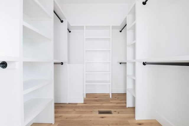 209 Crest Dr, Rocky Face, GA 30740 - spacious closet with wood finished floors