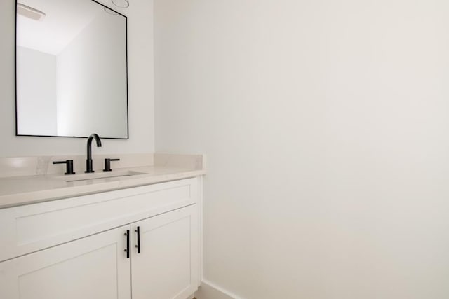 209 Crest Dr, Rocky Face, GA 30740 - bathroom featuring vanity and baseboards