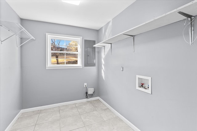 washroom with hookup for a washing machine, electric panel, and light tile patterned flooring