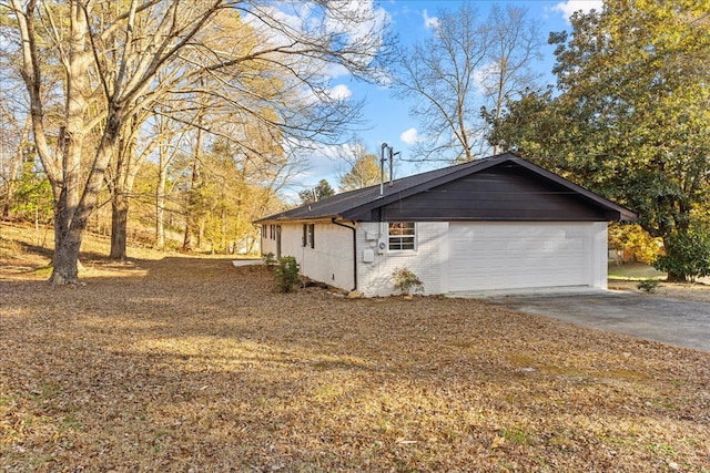 view of home's exterior featuring a garage