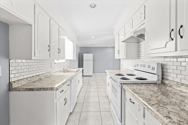 kitchen featuring sink, white cabinets, ornamental molding, light tile patterned floors, and white appliances