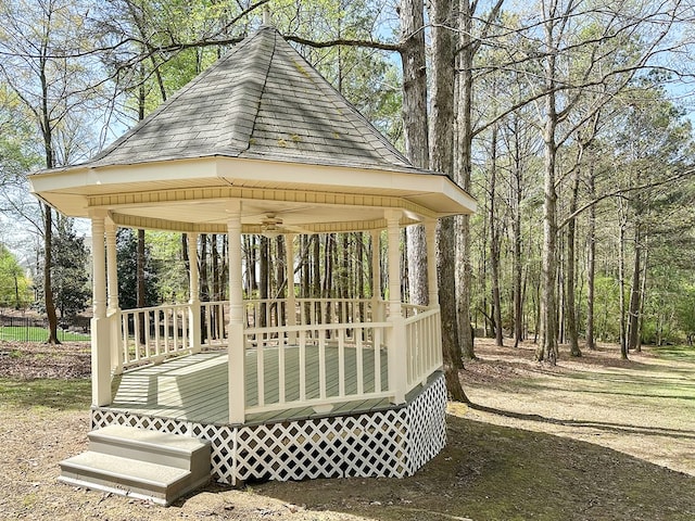 surrounding community with a gazebo and a deck