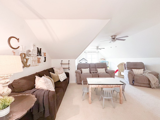 living area featuring light colored carpet, ceiling fan, and lofted ceiling