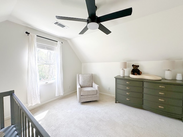 bedroom with baseboards, vaulted ceiling, a ceiling fan, visible vents, and light colored carpet