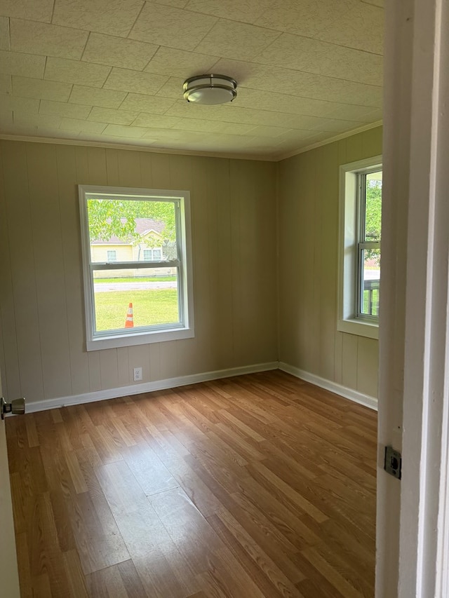 441 4th Ave, Dalton, GA 30721 - spare room with wood finished floors and crown molding