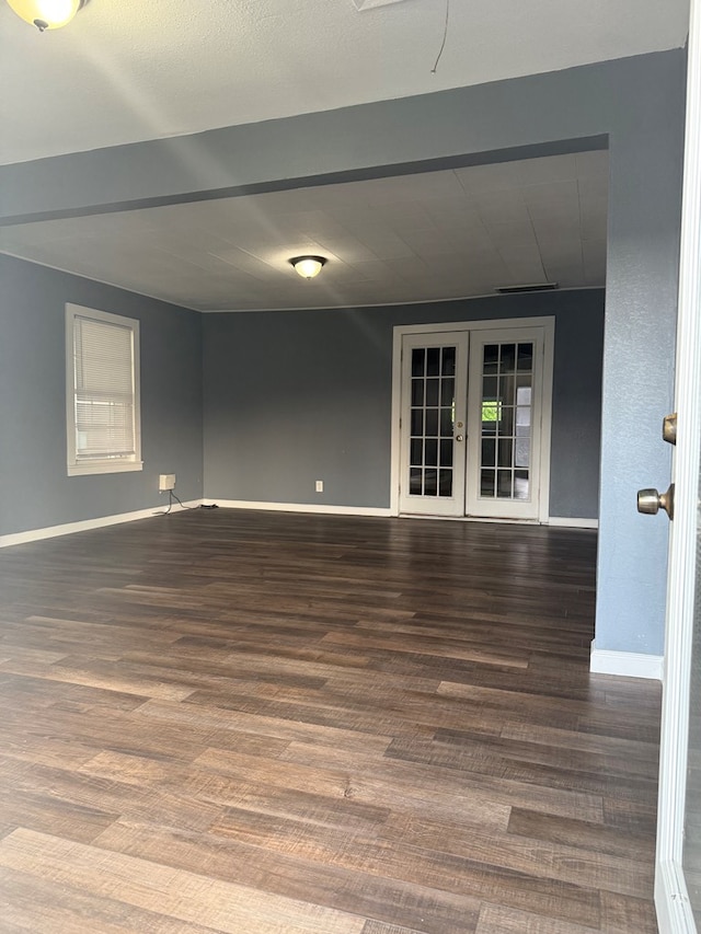 1802 Morris St, Dalton, GA 30721 - empty room featuring french doors, baseboards, and wood finished floors
