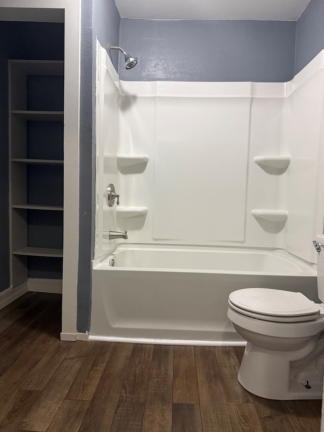 1802 Morris St, Dalton, GA 30721 - bathroom with wood finished floors, shower / tub combination, and toilet