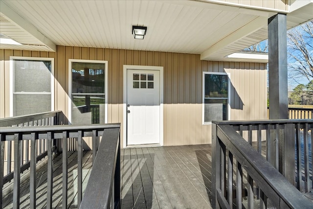 entrance to property with a deck