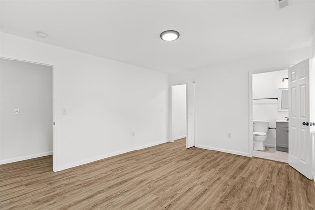 54 Austin Dr, Rossville, GA 30741 - unfurnished bedroom with light wood finished floors and connected bathroom