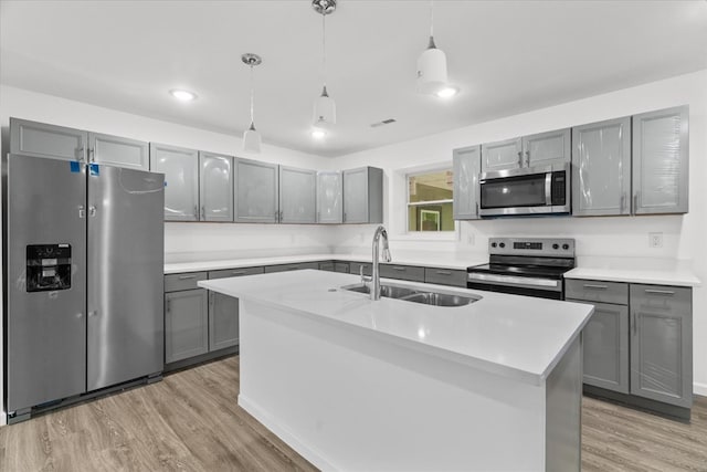 54 Austin Dr, Rossville, GA 30741 - kitchen with stainless steel appliances, gray cabinetry, light wood-style flooring, light countertops, and recessed lighting