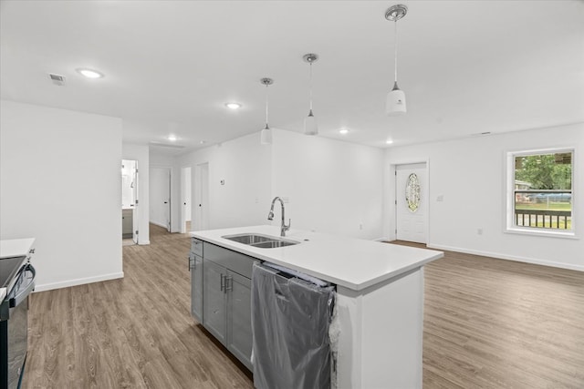 54 Austin Dr, Rossville, GA 30741 - kitchen with gray cabinetry, light wood finished floors, light countertops, recessed lighting, and decorative light fixtures