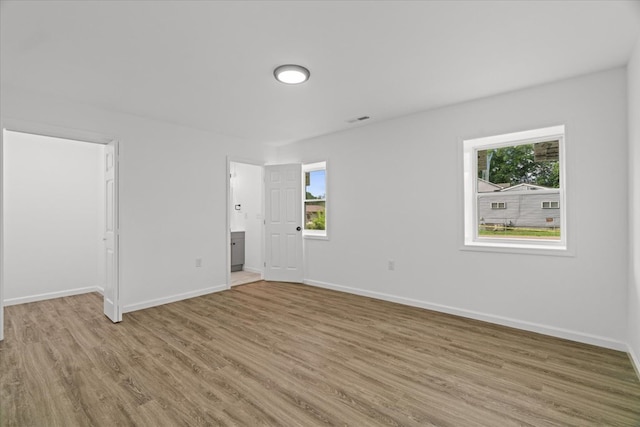54 Austin Dr, Rossville, GA 30741 - spare room with light wood-style floors and plenty of natural light