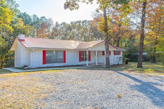 ranch-style home with covered porch