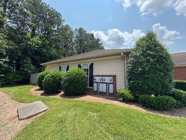 1694 Red Oak Dr Unit 185, Dalton, GA 30721 - view of property exterior featuring a lawn