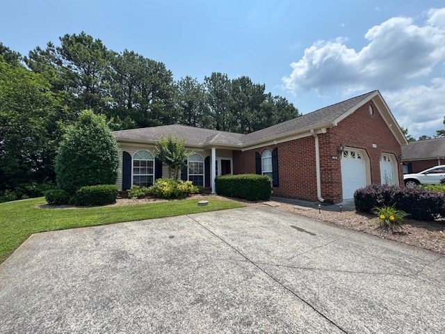 1694 Red Oak Dr Unit 185, Dalton, GA 30721 - ranch-style home with brick siding, an attached garage, and a front lawn