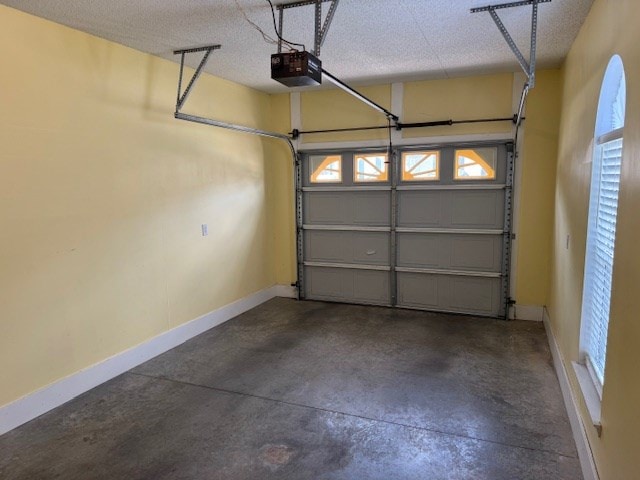 1694 Red Oak Dr Unit 185, Dalton, GA 30721 - garage with a garage door opener and baseboards
