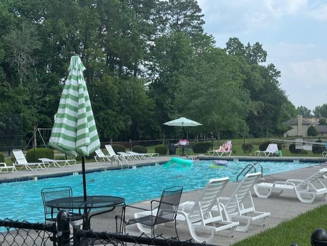 1694 Red Oak Dr Unit 185, Dalton, GA 30721 - community pool featuring a patio area
