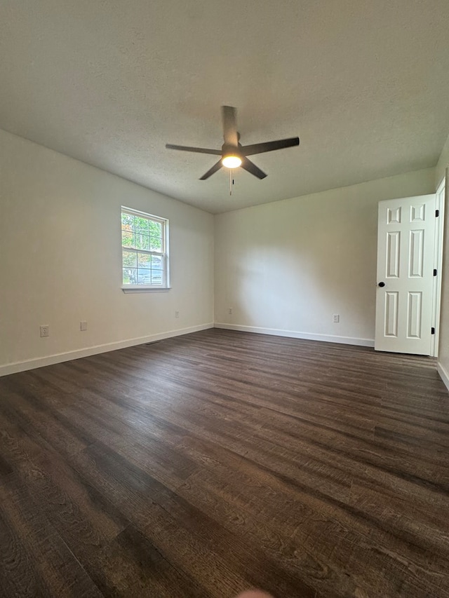 408 Ridgecrest Dr, Lafayette, GA 30728 - unfurnished room featuring dark wood finished floors, a ceiling fan, baseboards, and a textured ceiling