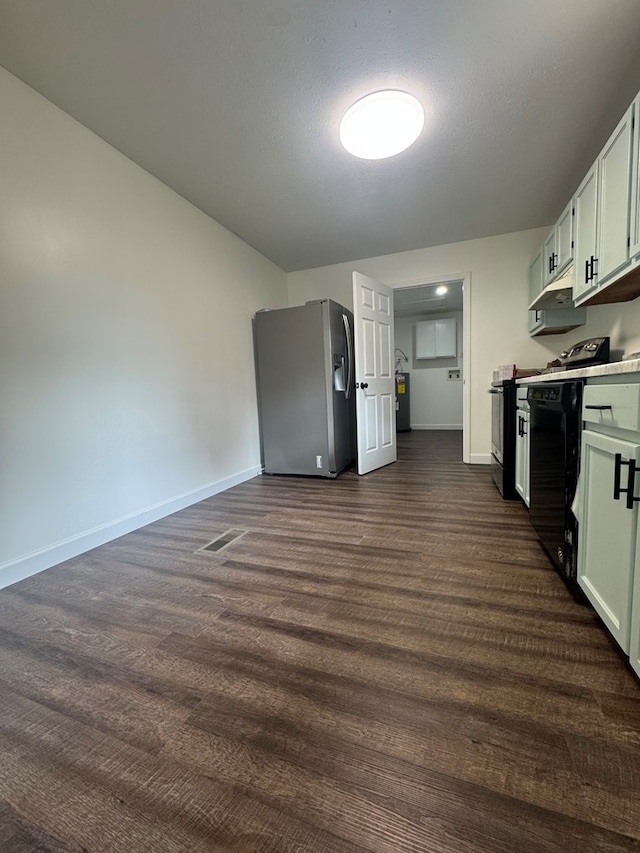 408 Ridgecrest Dr, Lafayette, GA 30728 - kitchen with stainless steel fridge, baseboards, dark wood-style floors, and light countertops