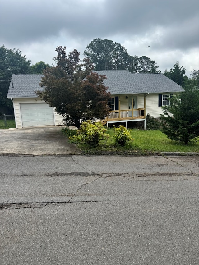 408 Ridgecrest Dr, Lafayette, GA 30728 - view of front of house featuring asphalt driveway, a shingled roof, and a garage