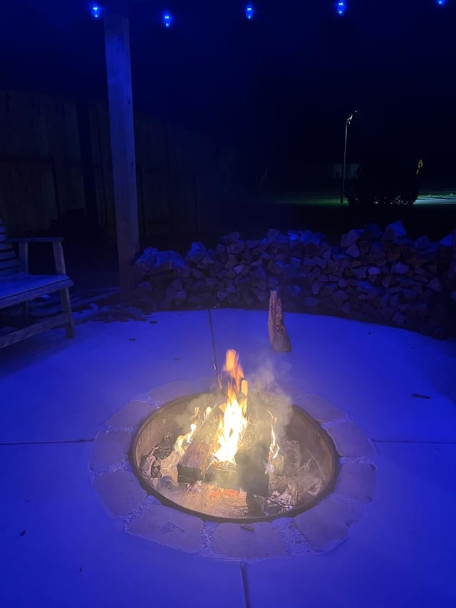 1000 Robin Way, Rocky Face, GA 30740 - pool at night featuring a fire pit