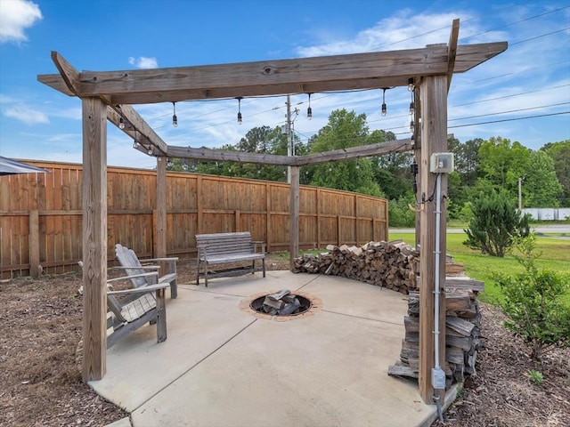 1000 Robin Way, Rocky Face, GA 30740 - view of patio featuring fence and a fire pit