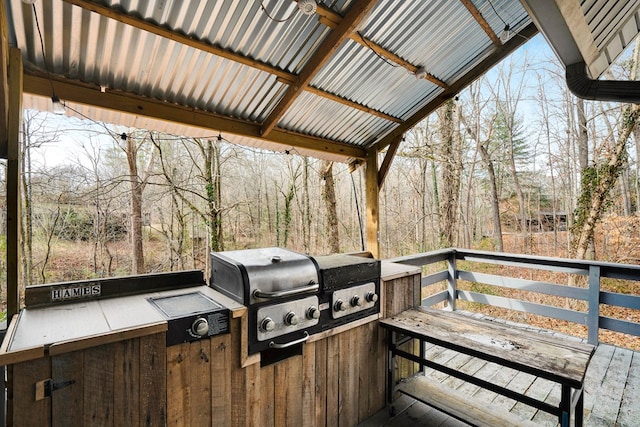 deck featuring area for grilling and grilling area