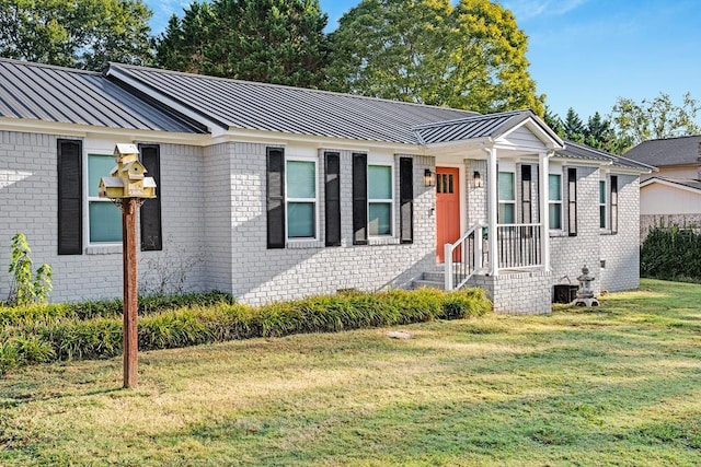 ranch-style house with a front lawn