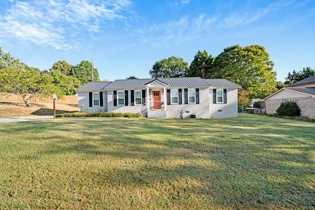 view of front of house with a front lawn