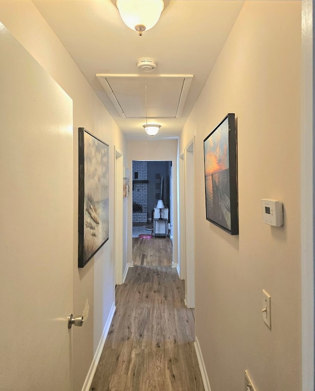 hallway featuring hardwood / wood-style flooring