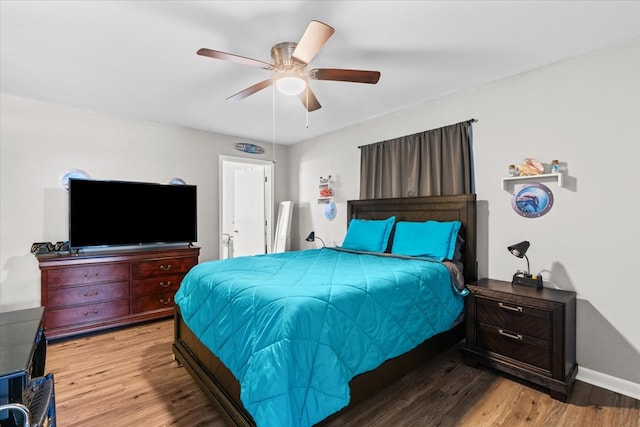 bedroom featuring ceiling fan and light wood-type flooring