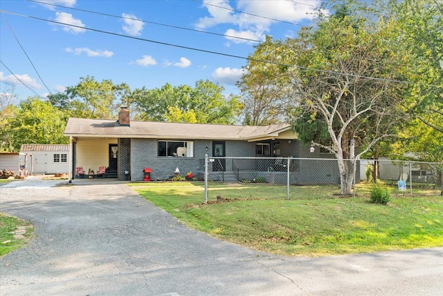 ranch-style house with a front lawn