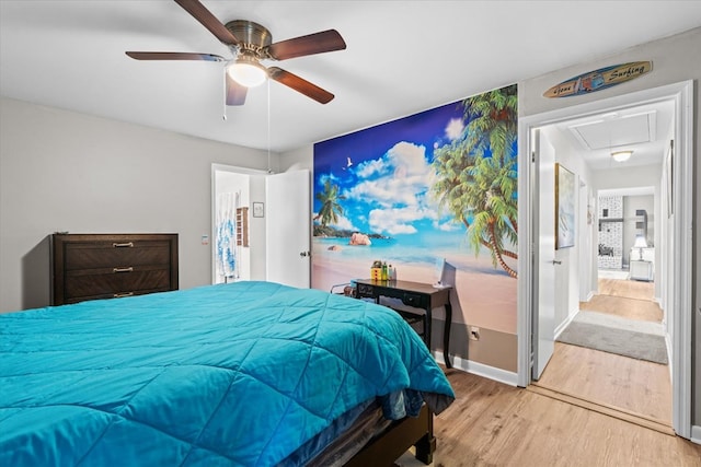 bedroom featuring ceiling fan and light wood-type flooring