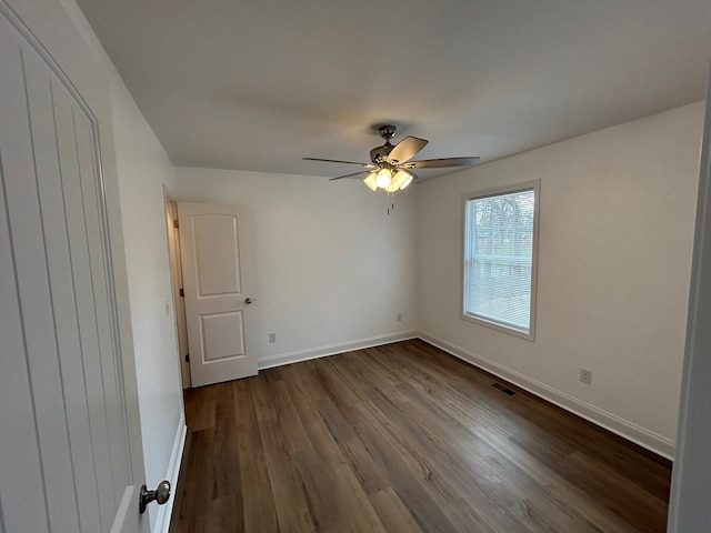 301 Shady Dr, Dalton, GA 30721 - unfurnished room featuring dark wood-type flooring and a ceiling fan
