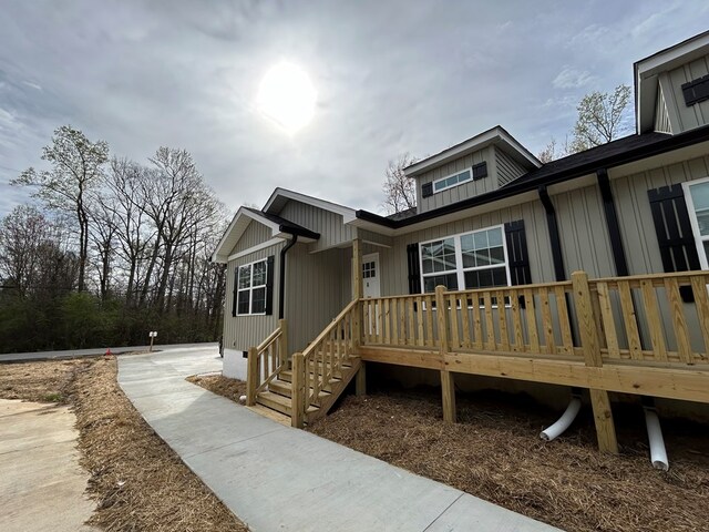301 Shady Dr, Dalton, GA 30721 - view of property exterior featuring a wooden deck and board and batten siding