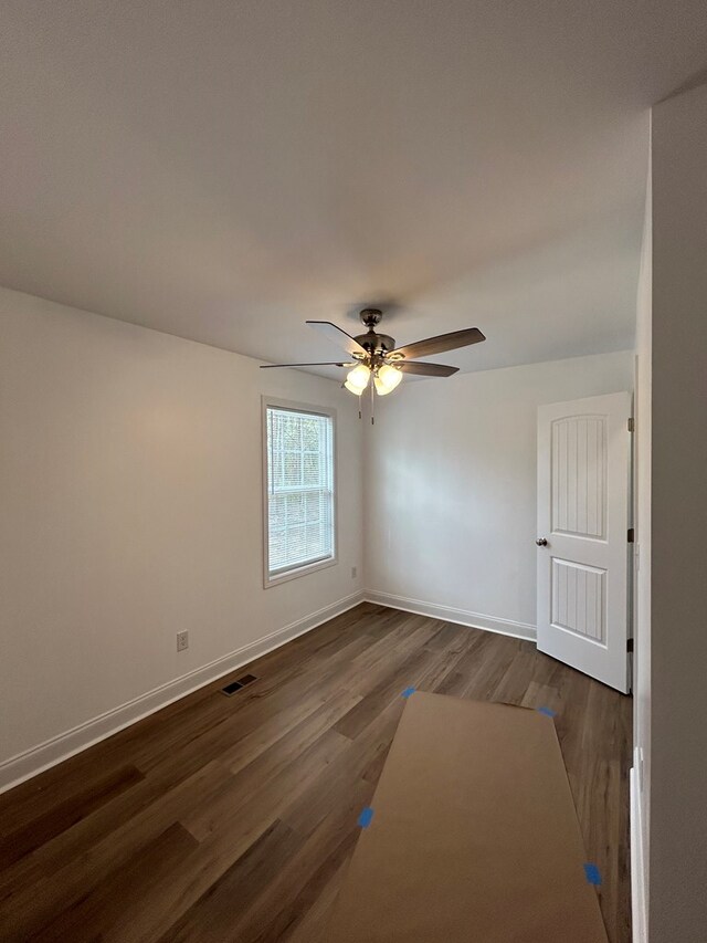301 Shady Dr, Dalton, GA 30721 - unfurnished room with dark wood finished floors and a ceiling fan