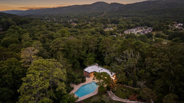 aerial view at dusk with a mountain view