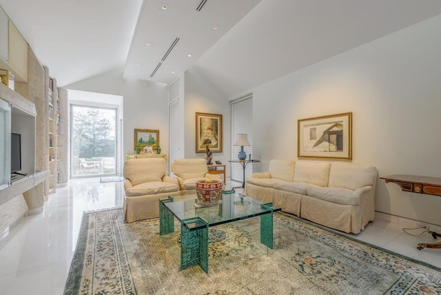 living room featuring lofted ceiling