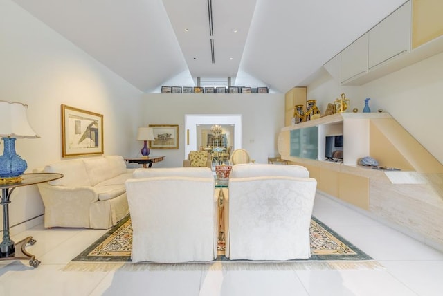 tiled living room with lofted ceiling