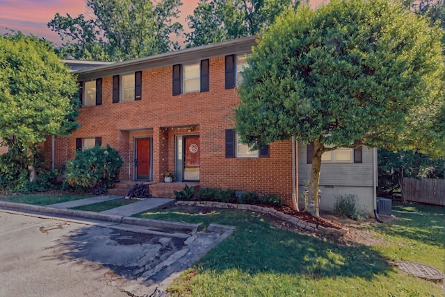 1900 Meadowbrook Cir, Dalton, GA 30720 - colonial-style house with central AC and brick siding