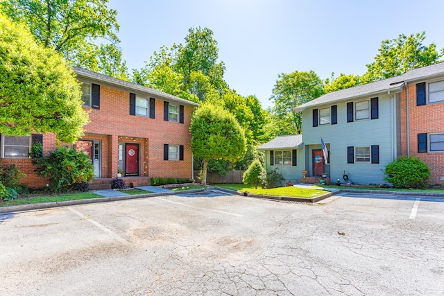 1900 Meadowbrook Cir, Dalton, GA 30720 - colonial home featuring uncovered parking and brick siding