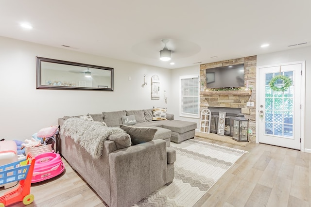 1900 Meadowbrook Cir, Dalton, GA 30720 - living area with ceiling fan, wood finished floors, a stone fireplace, and recessed lighting