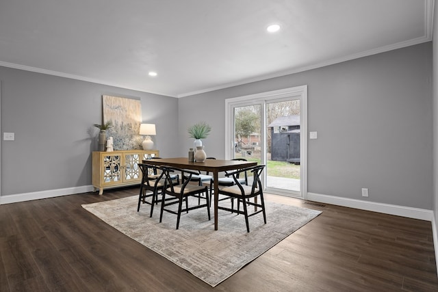 dining space with crown molding, baseboards, recessed lighting, and dark wood-style floors