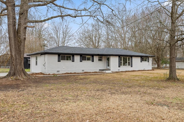 single story home with crawl space, brick siding, a front lawn, and a shingled roof